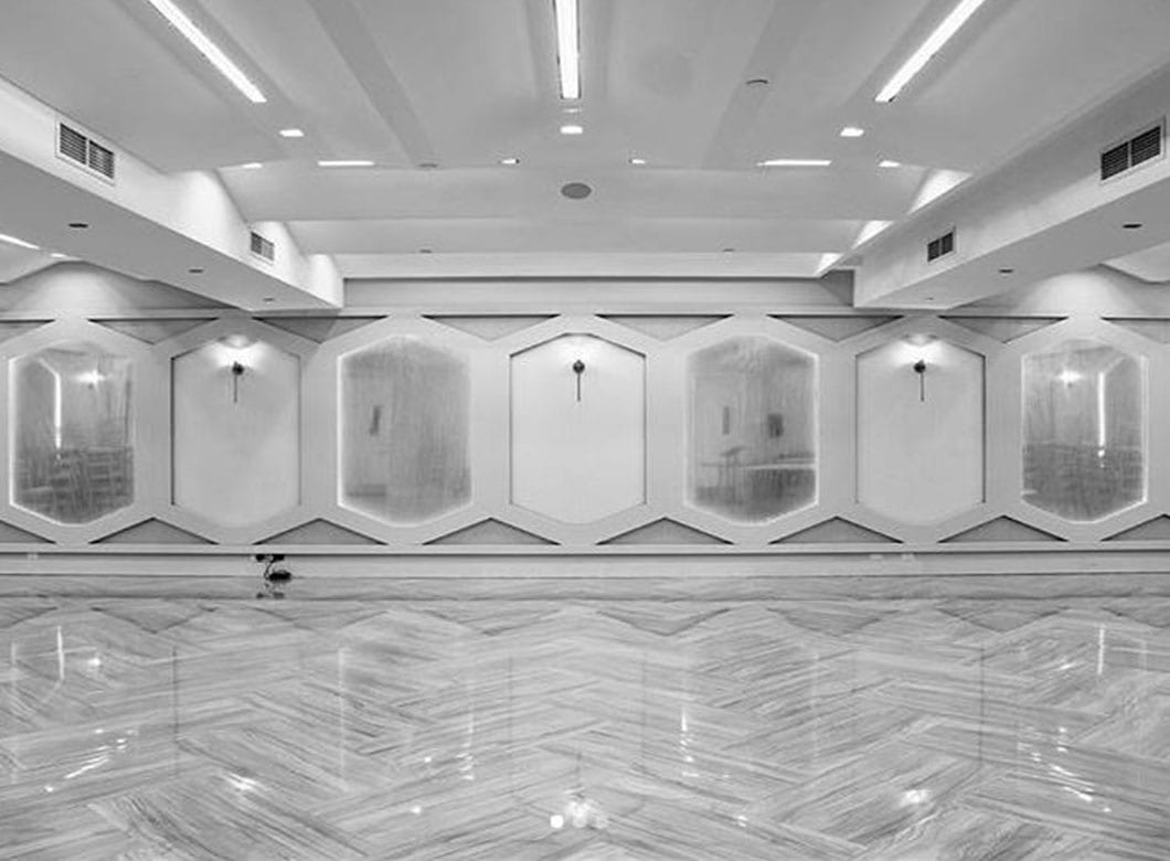 The custom art glass wall cladding by Archetype Glass for the Spruce Street Synagogue