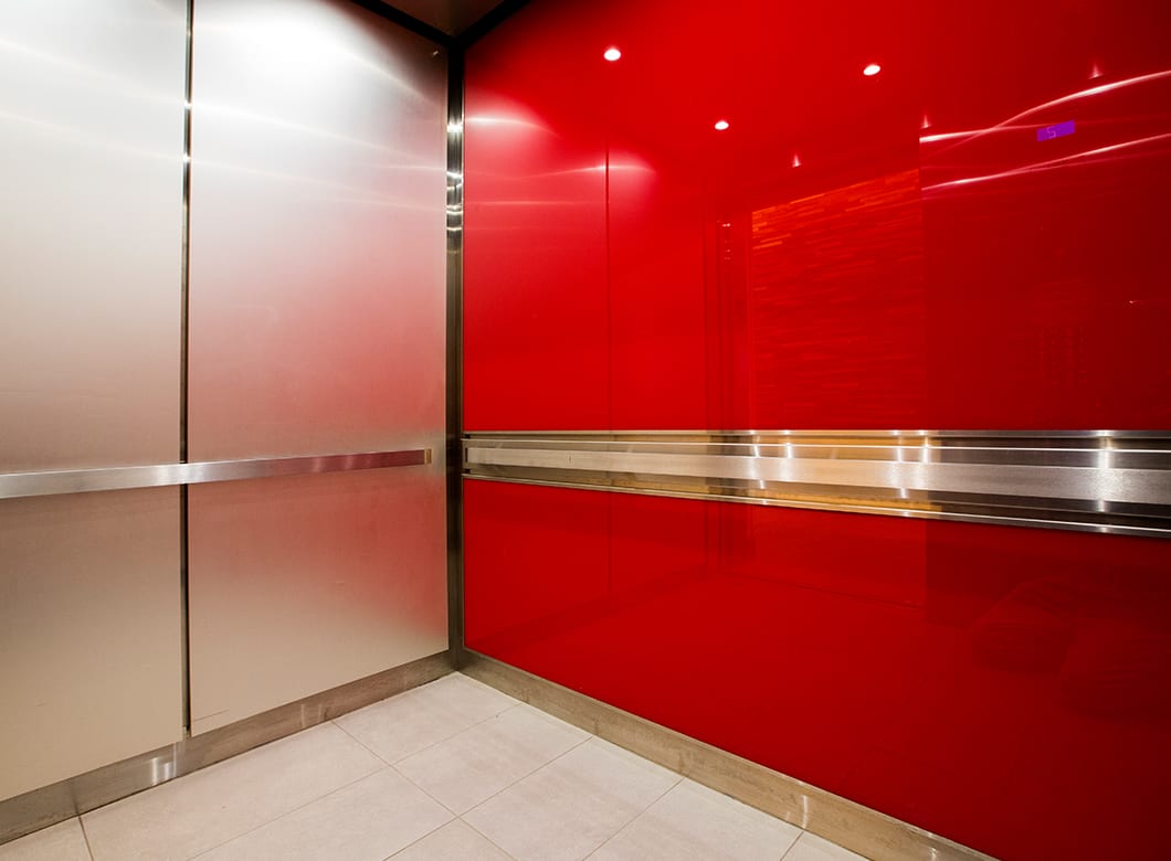 The custom glass elevator cab cladding for the Cambria Hotel Washington, D.C. Convention Center, by Archetype Glass