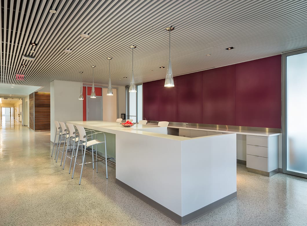 A wide view of the custom glass wall cladding by Archetype Glass, at Gates Vascular Institute