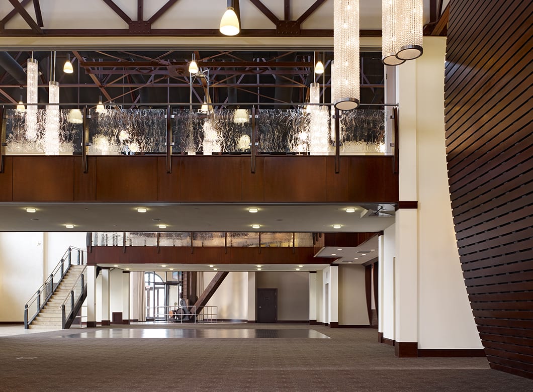 Custom art glass railings at the Phoenixville Foundry, designed by Archetype Glass