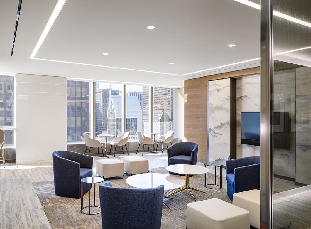A wide view of the Capital Group's office, with the custom glass partition walls created by Archetype Glass