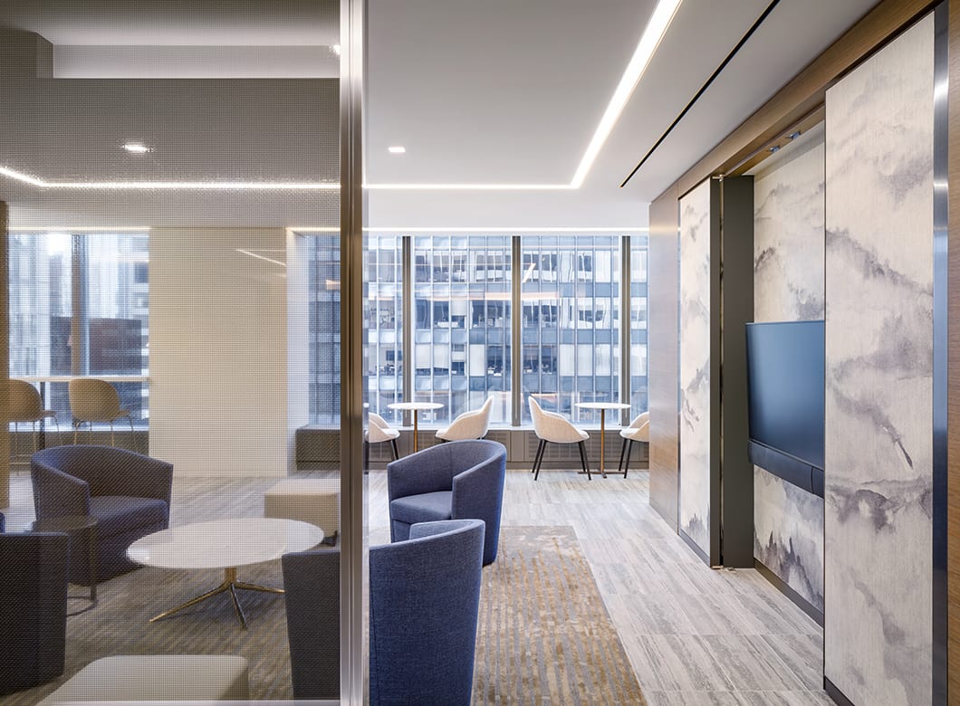 The Capital Group's office, with a close-up view of the Archetype Glass custom laminated partition walls