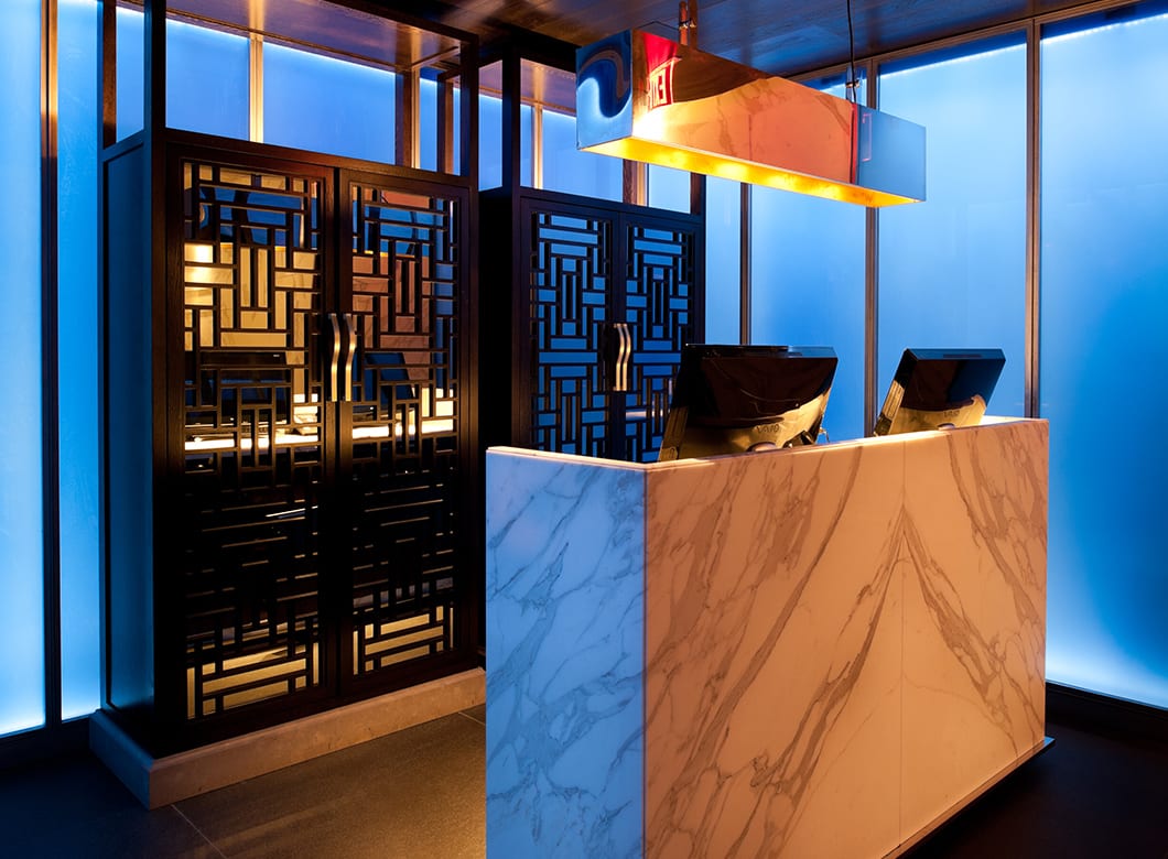 Fully opaque custom glass wall cladding at Hakkasan Restaurant, customized by Archetype Glass