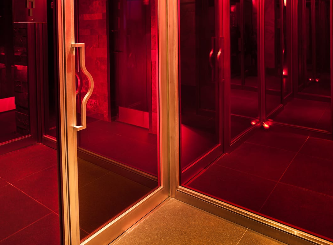 The beautiful custom laminated glass wall cladding used in the Hakkasan Restaurant, crafted by Archetype Glass